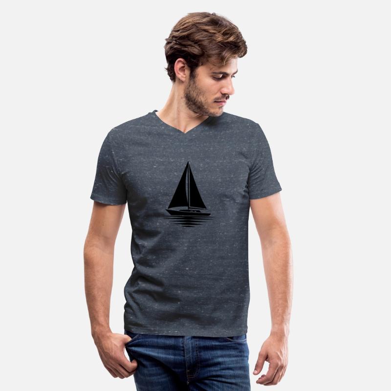 Calm Water With Sailboat And Sails Set